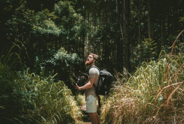 Person spending time in nature through outdoor experiences and active lifestyle