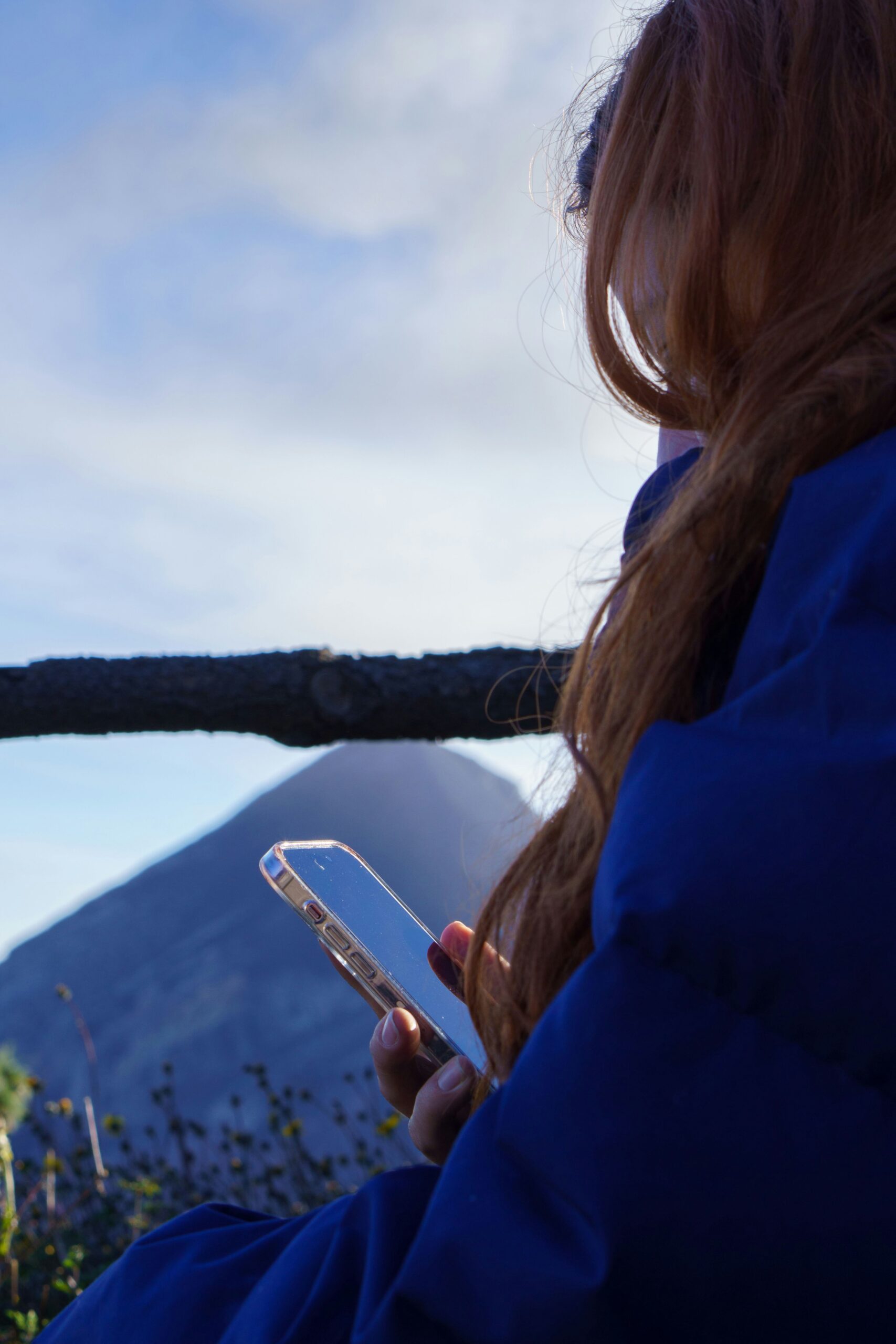 Person disconnecting from screens and reconnecting with outdoor experiences through an active lifestyle